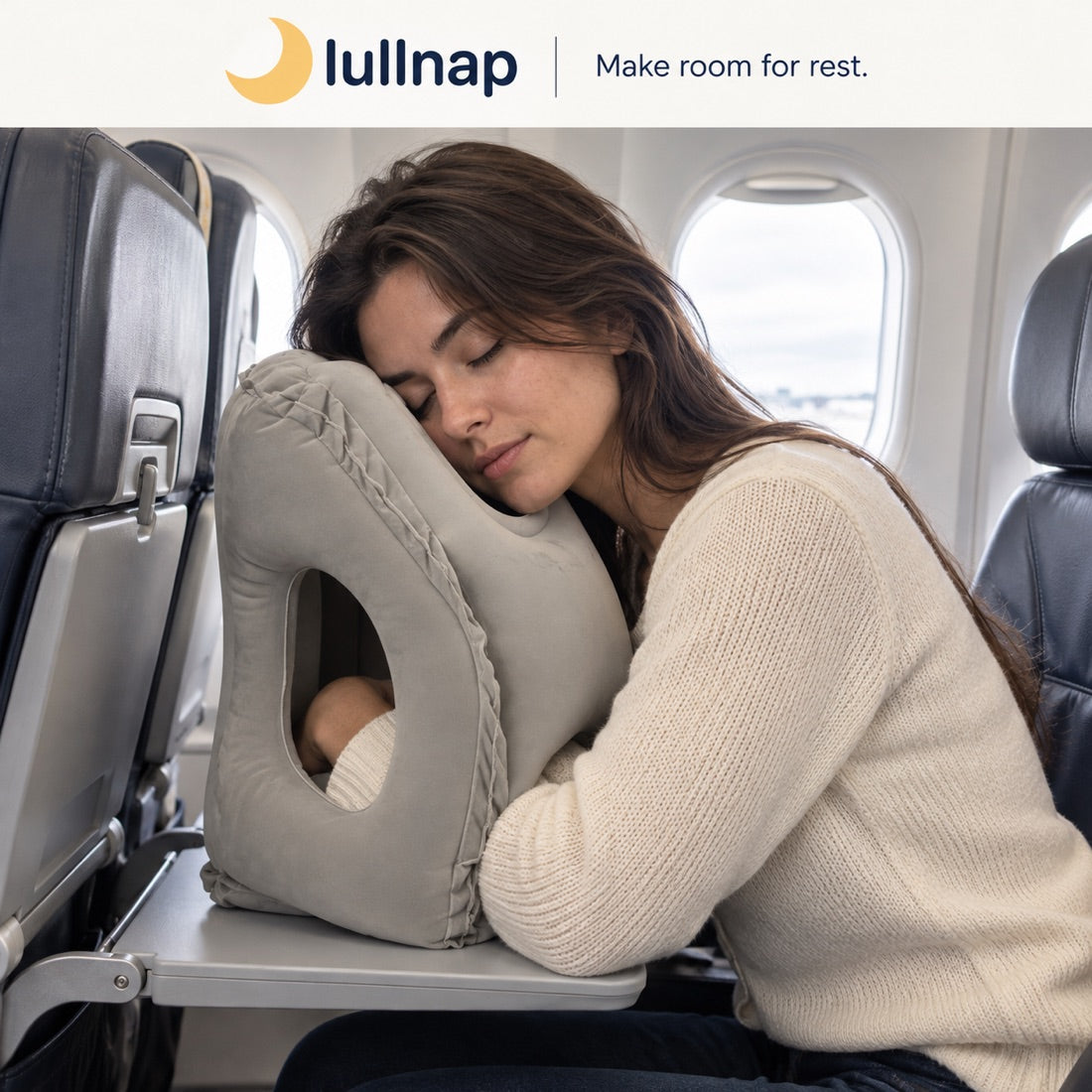 Woman asleep on a plane, leaning forward on the Lullnap pillow